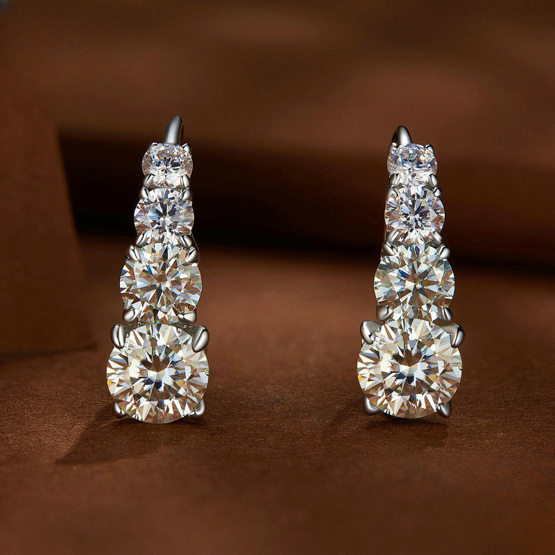 Add a touch of elegance with these stunning Moissanite stud earrings, featuring 1.72 carat total weight in a vintage 18K gold plated setting. Crafted from 925 sterling silver, these earrings are perfect for daily wear or special occasions. A thoughtful