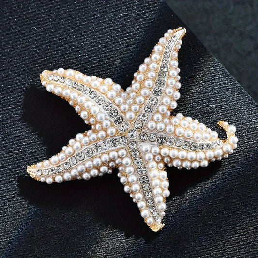 Vintage starfish shaped brooch adorned with faux pearls, perfect for adding a touch of elegance to women's dresses, sweaters, and other clothing accessories.