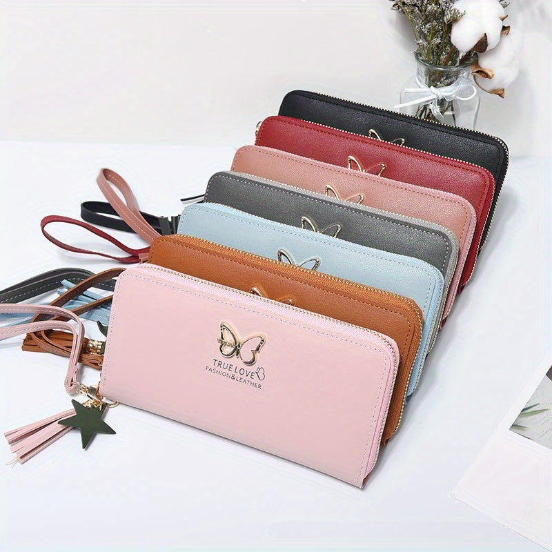 Butterfly wallet made of faux leather with wristlet, multiple card slots, zip closure, animal pattern, and polyester lining. Perfect gift for various occasions. Random color wristband