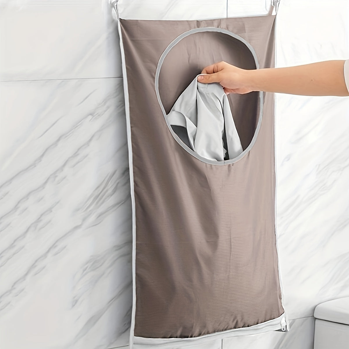 Organize your bathroom, bedroom, and home with our Space-Saving Hanging Laundry Hamper! This fabric storage bag measures 76.99cm x 49.99cm.