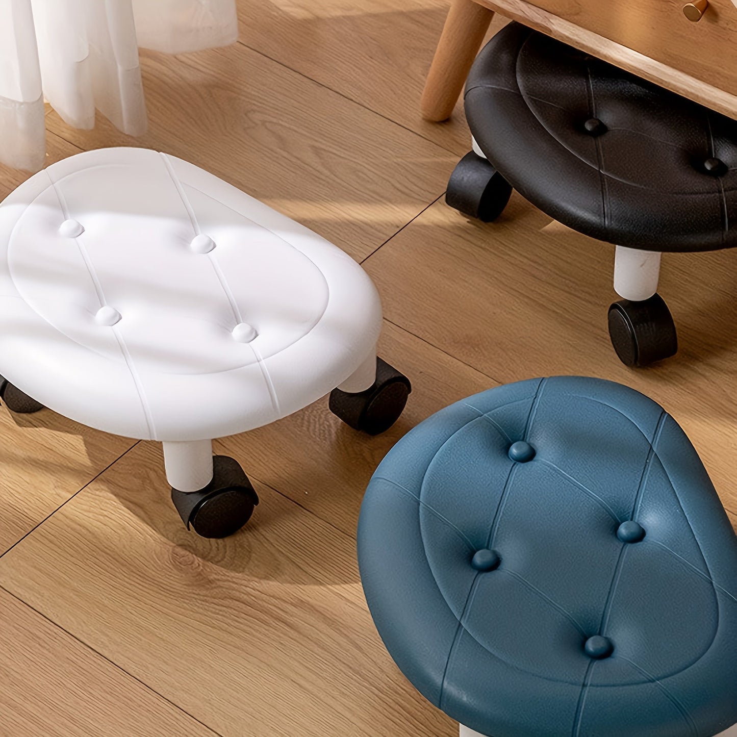 Get the sleek and sturdy 1-piece COFIT Rolling Low Stool with Wheels in your choice of White, Deep Blue, or Black. Perfect for various spaces in your home, from the entryway to the bathroom and bedroom. Ideal for changing shoes and organizing your home