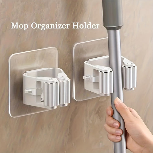 Hang your mops with ease using the 2/4 piece Hanging Mop Storage Rack. This buckle-secured rack is perfect for any bathroom, ensuring a clutter-free space. Made of durable plastic, this storage holder is ideal for bedrooms, gardens, dorms, and homes