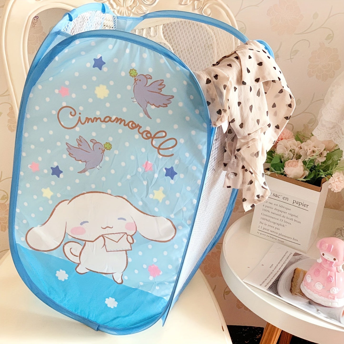 Kawaii and adorable Sanrio storage bag featuring Hello Kitty and Kuromi. This foldable organizer can be used for storing dirty clothes or as a laundry basket.