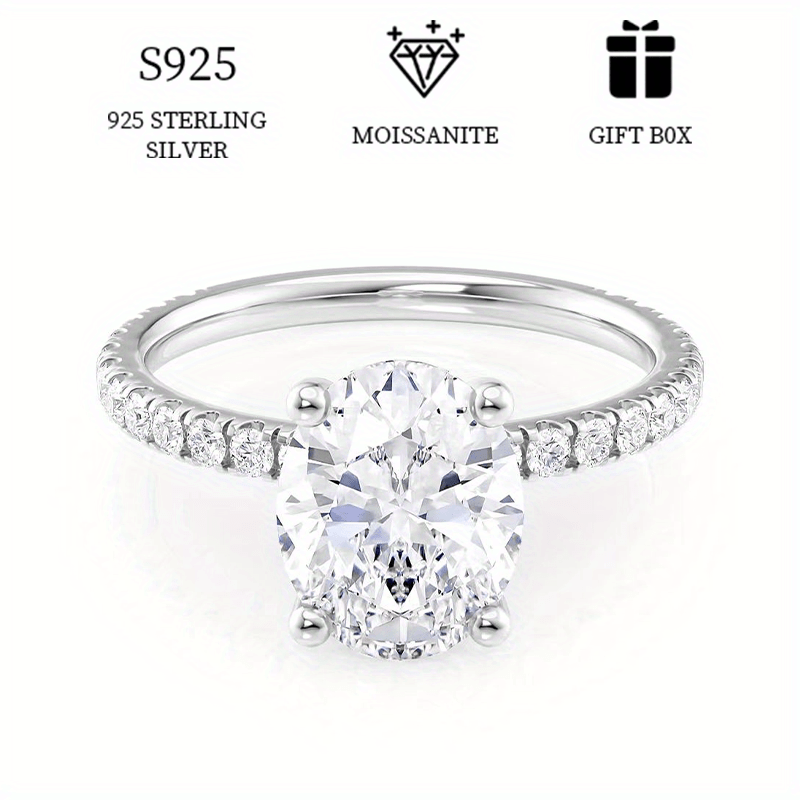 Sterling Silver Oval Moissanite Engagement Ring, featuring an elegant 4-claw pave setting. A timeless women's fashion accessory, ideal for proposals, anniversaries, birthdays, and Mother's Day. Comes in a beautiful gift box.