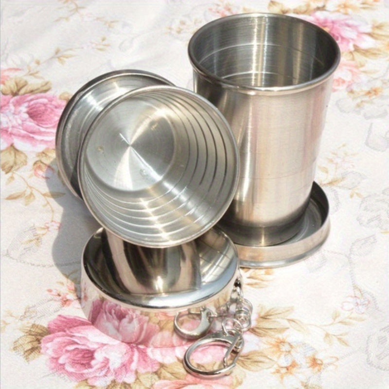 75ml stainless steel folding cup with keychain, ideal for camping and hiking. Hand wash only. Reusable and recyclable.