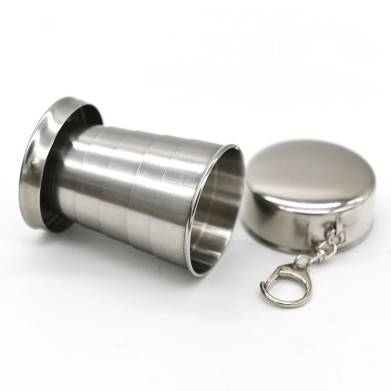 75ml stainless steel folding cup with keychain, ideal for camping and hiking. Hand wash only. Reusable and recyclable.