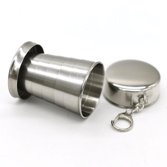 75ml stainless steel folding cup with keychain, ideal for camping and hiking. Hand wash only. Reusable and recyclable.