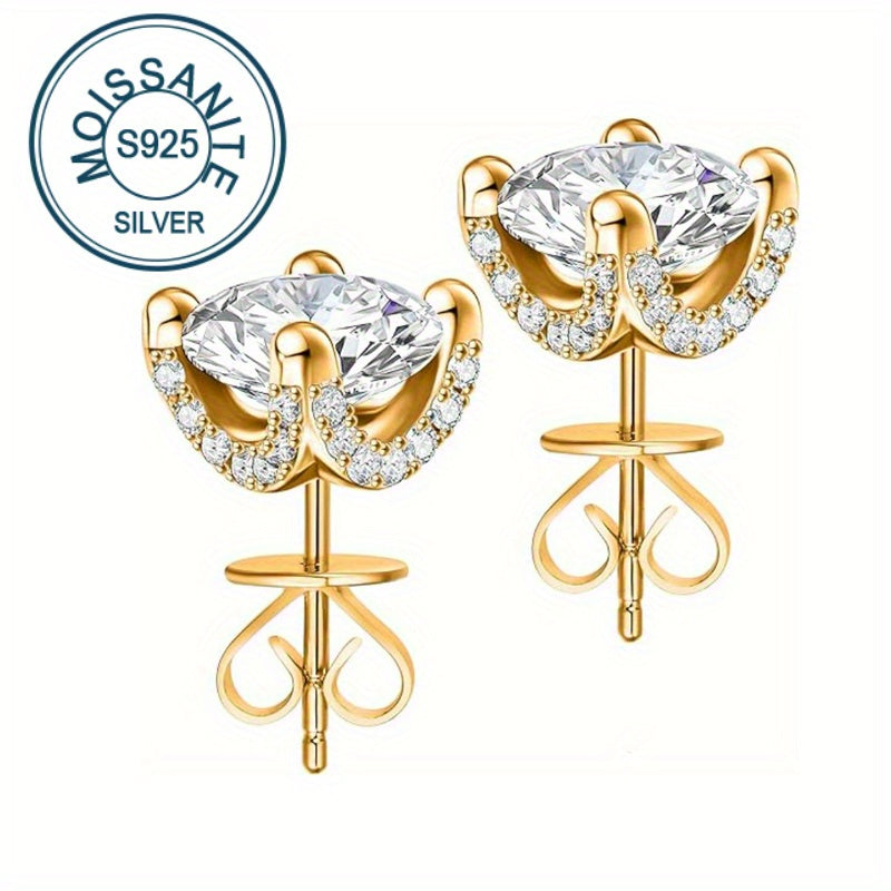 These European and American Fashion Sterling Silver Stud Earrings feature two 1 Carat Moissanite stones set in four claws. They showcase a creative personality with a gorgeous, mature, and luxurious design. These earrings are versatile, perfect for daily