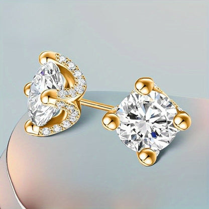 These European and American Fashion Sterling Silver Stud Earrings feature two 1 Carat Moissanite stones set in four claws. They showcase a creative personality with a gorgeous, mature, and luxurious design. These earrings are versatile, perfect for daily