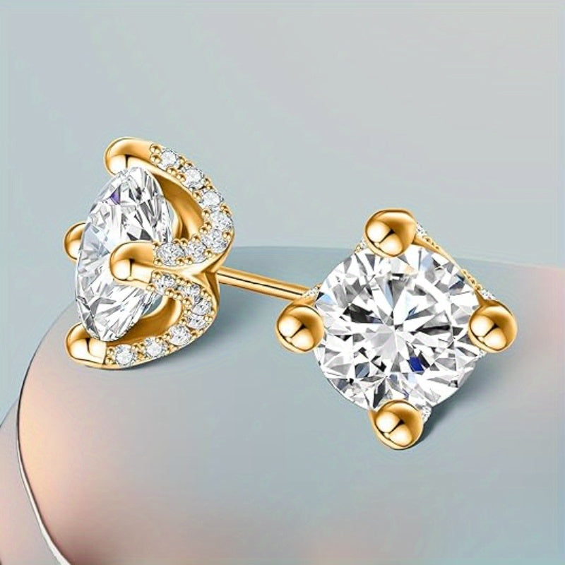 These European and American Fashion Sterling Silver Stud Earrings feature two 1 Carat Moissanite stones set in four claws. They showcase a creative personality with a gorgeous, mature, and luxurious design. These earrings are versatile, perfect for daily