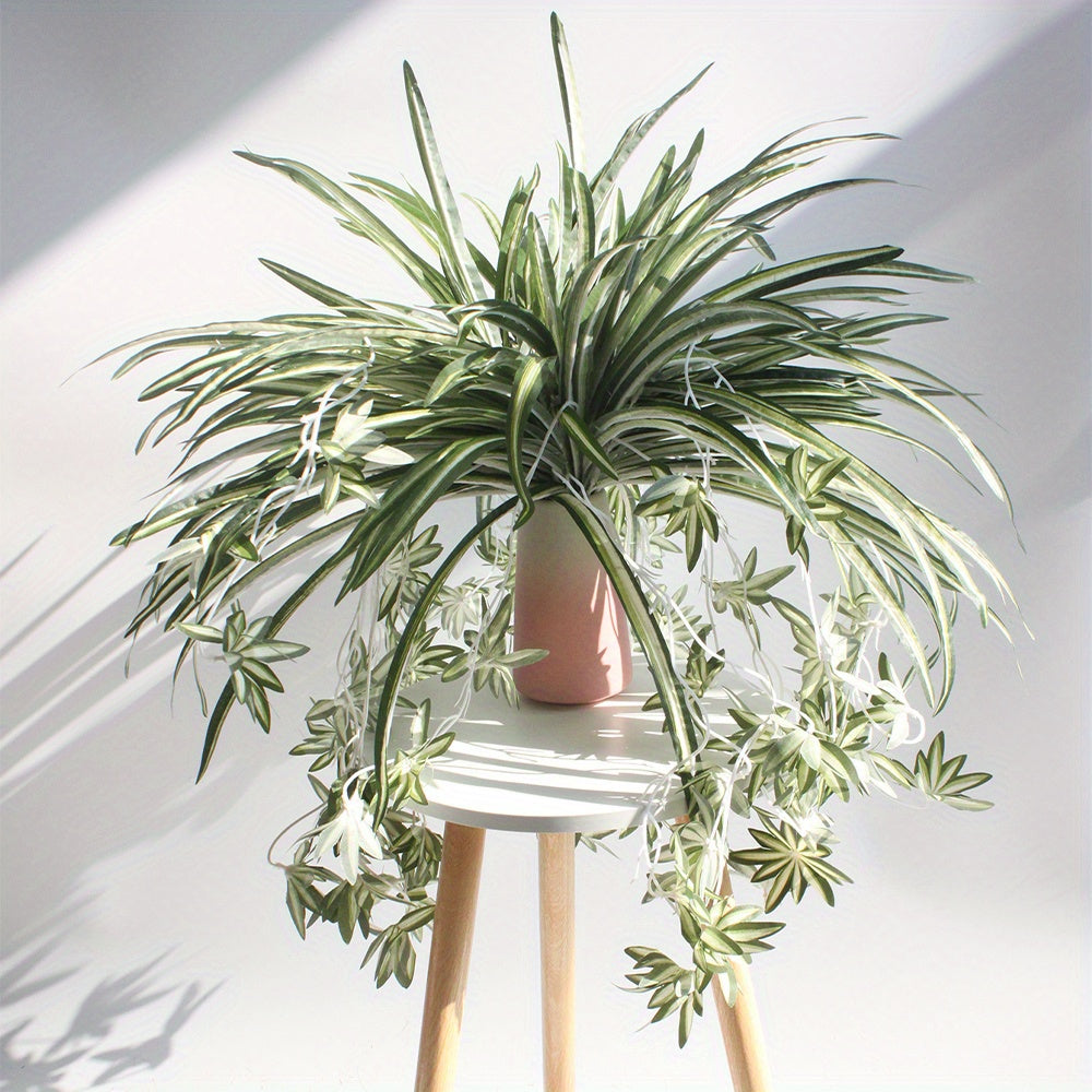 2 faux spider plants made of lifelike fabric for home, office, and wedding decor. Pot not included.