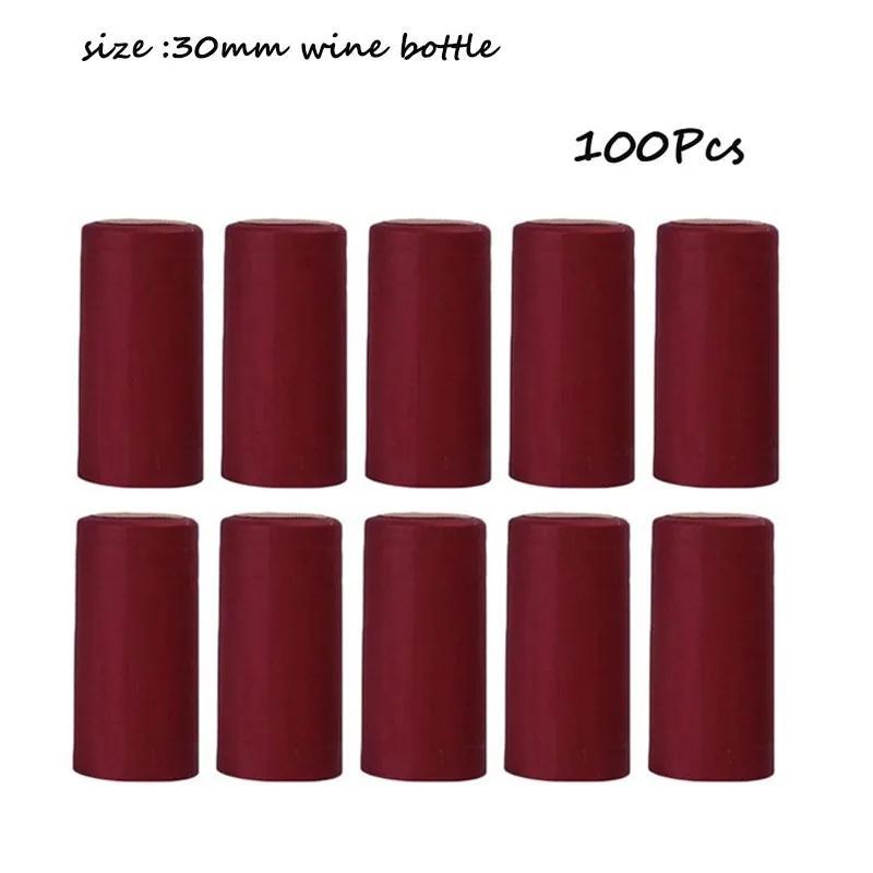 100 PVC heat shrink capsules with tear tab for wine bottles; shrinkable film wrap for straight mouth bottles.