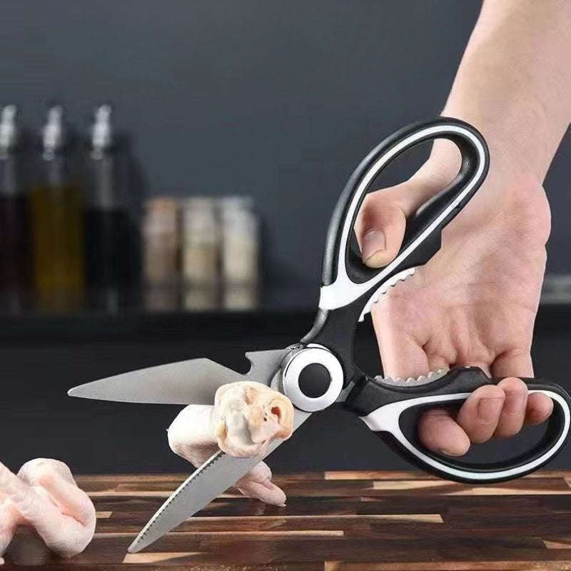 Durable stainless steel kitchen shears with sharp blades and comfort grip handle for cutting meat, herbs, and vegetables.