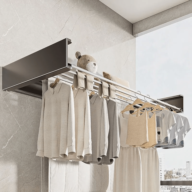 Space-Saving Metal Clothes Drying Rack: A versatile wall-mounted solution with an extendable towel bar, capable of holding up to 27.22KG. Perfect for organizing your bedroom, bathroom, closet, or wardrobe. Can also be used as a towel rack or clothesline.