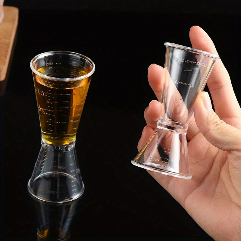 2 double-headed bar measuring cups for accurate cocktail mixing at home or professionally, made of clear plastic.