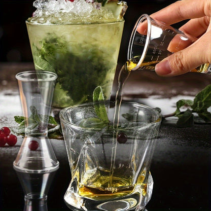 2 double-headed bar measuring cups for accurate cocktail mixing at home or professionally, made of clear plastic.