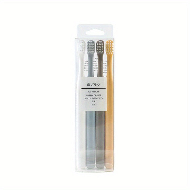 4 Macaron toothbrushes with soft bristles, bamboo charcoal handle, gentle on gums, deep cleaning dental care.