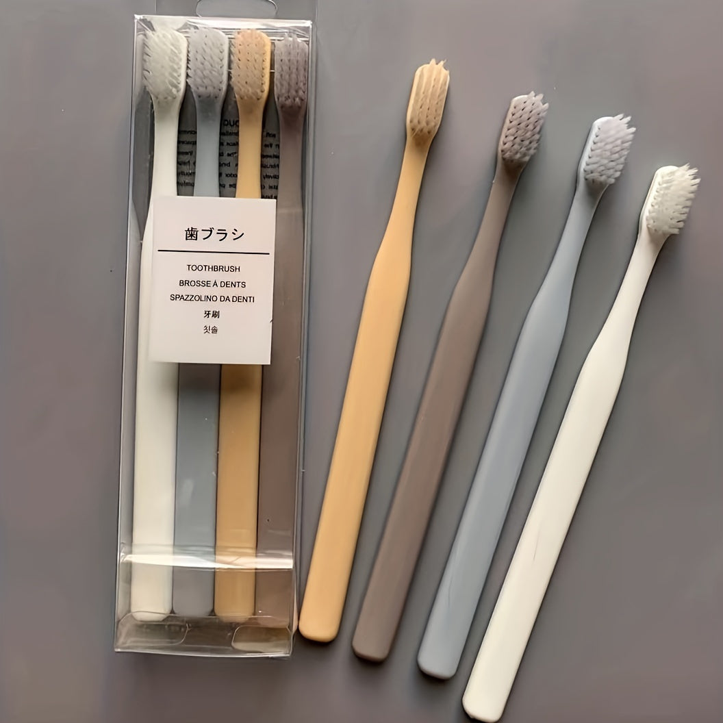 4 Macaron toothbrushes with soft bristles, bamboo charcoal handle, gentle on gums, deep cleaning dental care.