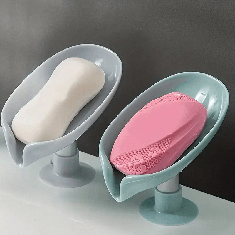 Luxury wall-mounted soap dish with suction cup.