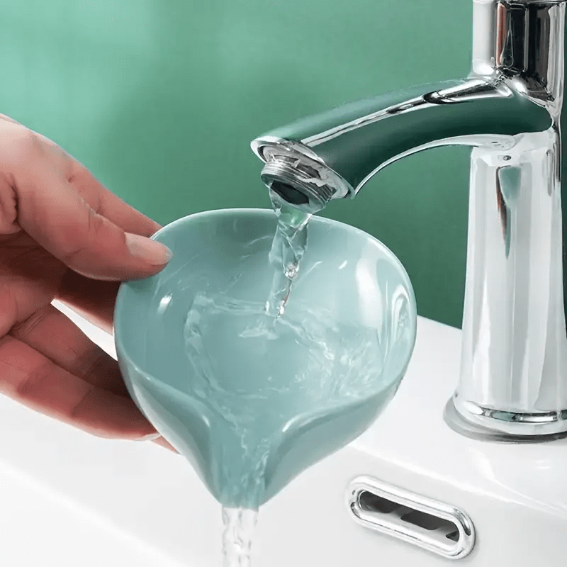 Luxury wall-mounted soap dish with suction cup.