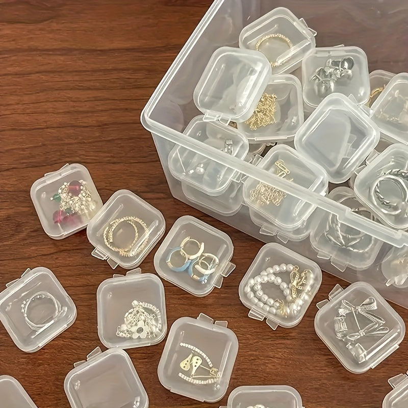 20 clear plastic jewelry storage boxes with lids for earrings and small craft projects, ideal for organizing accessories.