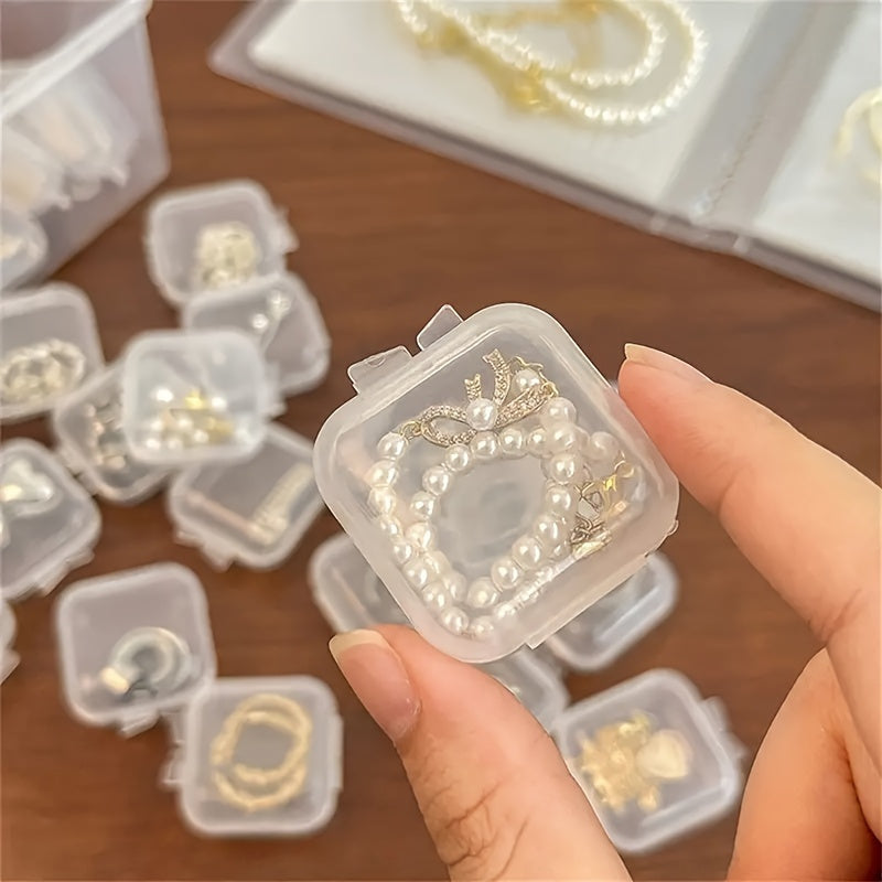 20 clear plastic jewelry storage boxes with lids for earrings and small craft projects, ideal for organizing accessories.