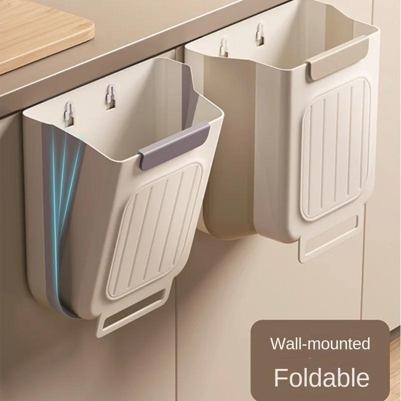 Thickened, foldable kitchen trash can hangs inside cabinet for storage without bending.