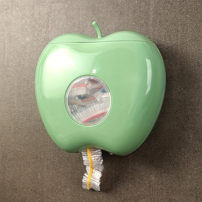 Apple-shaped wall-mounted storage organizer for plastic wrap and food covers. Unique closure, non-waterproof.