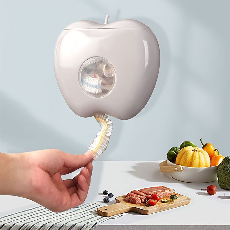 Apple-shaped wall-mounted storage organizer for plastic wrap and food covers. Unique closure, non-waterproof.