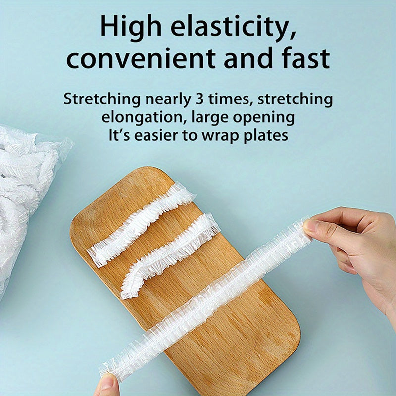 100 pieces of disposable food covers made of plastic wrap with elastic bands - ideal for covering fruits, bowls, and cups to keep them fresh in the kitchen.