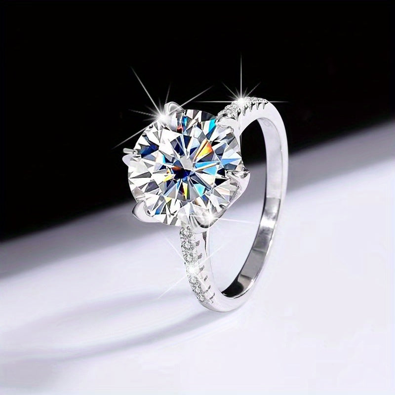 Customize your own 5/10ct Moissanite Ring with 925 Sterling Silver and 18K Golden Plating. This elegant piece features a bohemian and minimalist design, making it perfect for evening parties and weddings. Comes with a certificate of authenticity and a