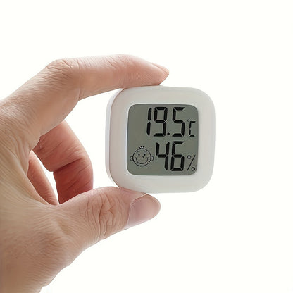 Small white LCD digital thermometer hygrometer with battery, accurate temperature and humidity monitor for home. Features include a joyful face indicator, mini design, and humidity control. Powered by batteries.