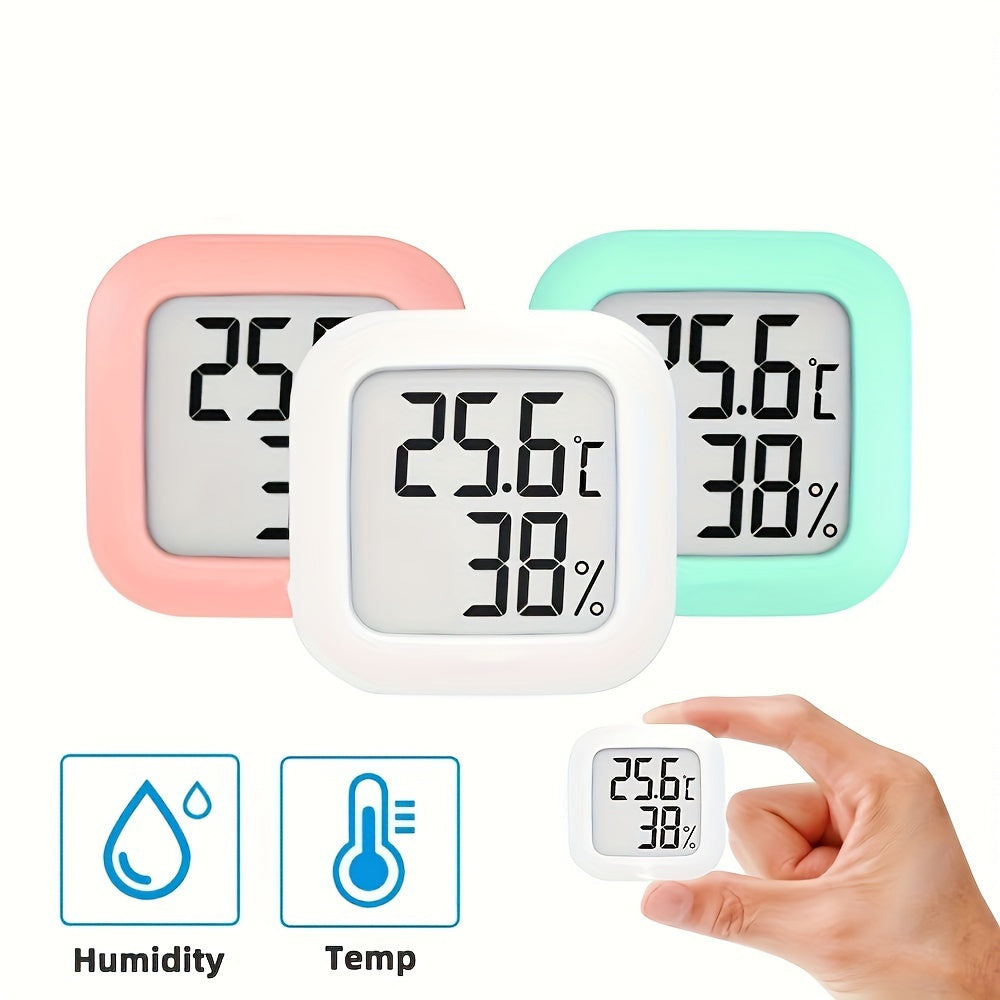 Small white LCD digital thermometer hygrometer with battery, accurate temperature and humidity monitor for home. Features include a joyful face indicator, mini design, and humidity control. Powered by batteries.