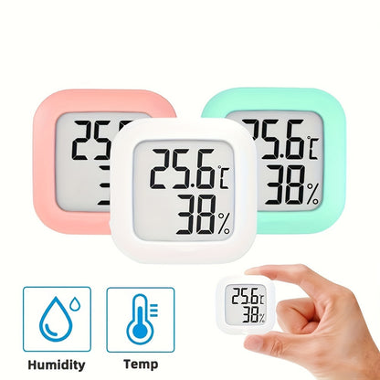 Small white LCD digital thermometer hygrometer with battery, accurate temperature and humidity monitor for home. Features include a joyful face indicator, mini design, and humidity control. Powered by batteries.