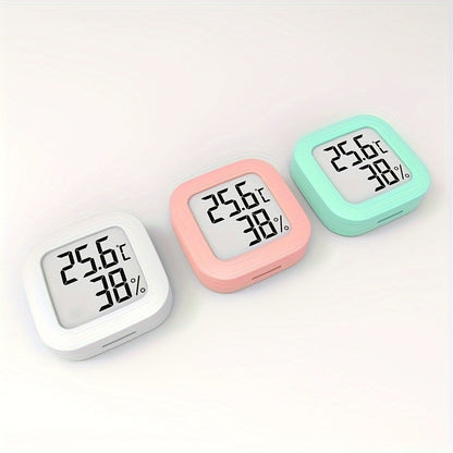 Small white LCD digital thermometer hygrometer with battery, accurate temperature and humidity monitor for home. Features include a joyful face indicator, mini design, and humidity control. Powered by batteries.