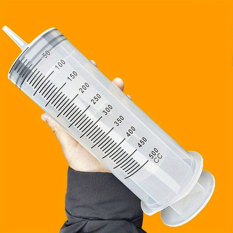 Large capacity hand-feeding syringe for birds, made of ABS material, with 1m tube for avian feeding and ink application.