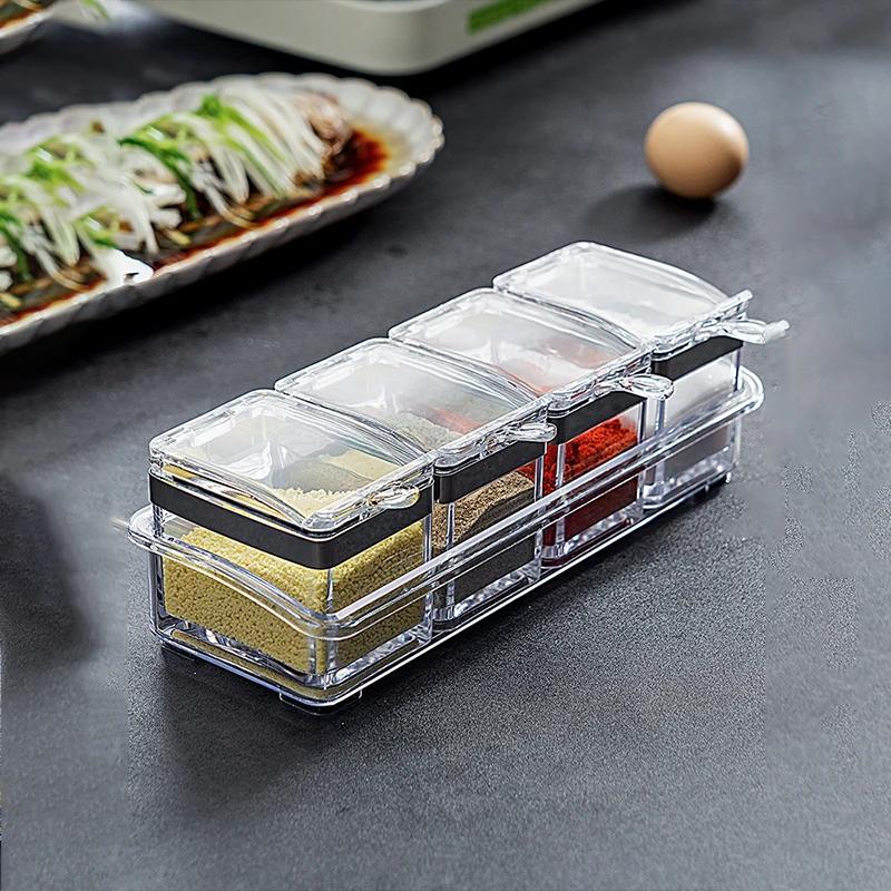 Organize your spices with ease using this 4-in-1 set of clear acrylic spice organizers. Each container comes with a lid and serving spoon, making it perfect for storing salt, sugar, and other seasonings. This space-saving kitchen storage solution will