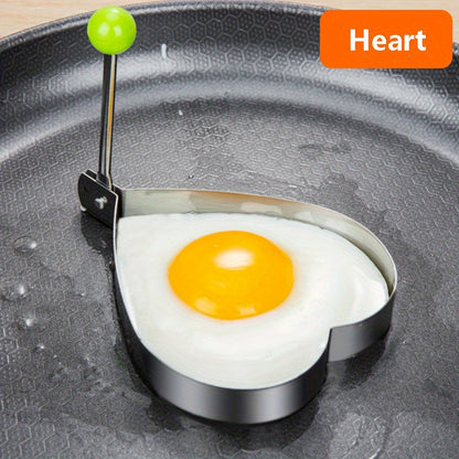 Set of 4 stainless steel egg molds for shaping breakfast at home. Includes heart, star, flower, and round shapes.