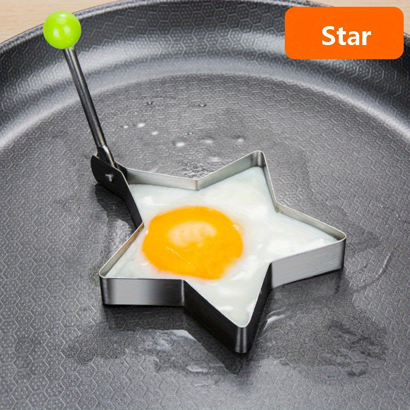 Set of 4 stainless steel egg molds for shaping breakfast at home. Includes heart, star, flower, and round shapes.