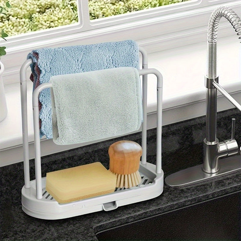 Space-saving kitchen organizer with quick-dry sponge and cloth stand, made of durable plastic. Perfect for keeping countertops organized and neat. Features a practical design for functionality.