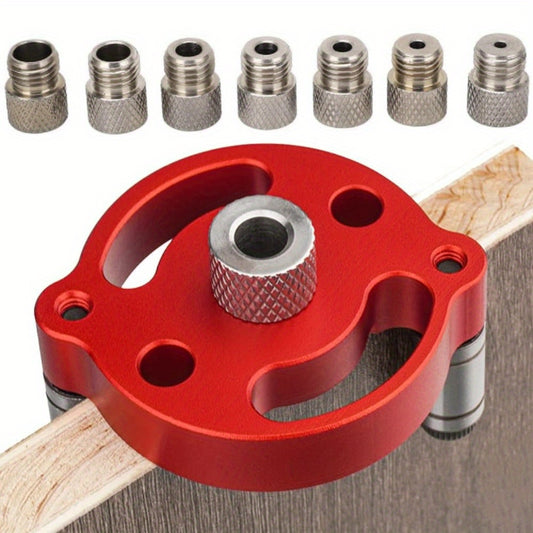 Self-centering doweling jig for straight holes in wood panels, handheld drill guide for woodworking joints.