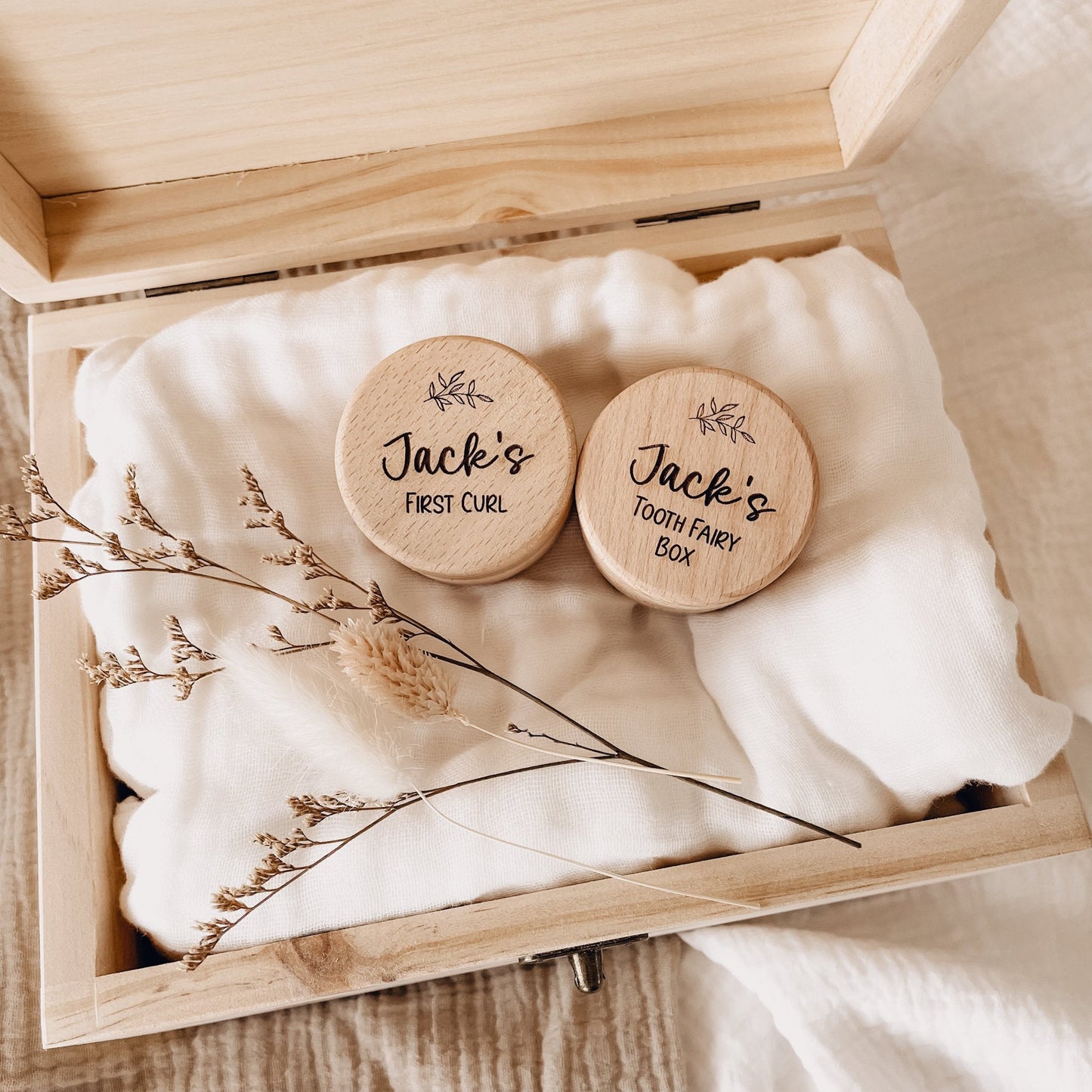 Customize a wooden keepsake for your little one - perfect for capturing their hair and footprints in their first photos.