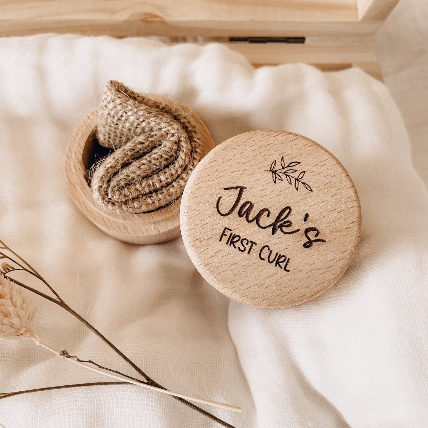 Customize a wooden keepsake for your little one - perfect for capturing their hair and footprints in their first photos.