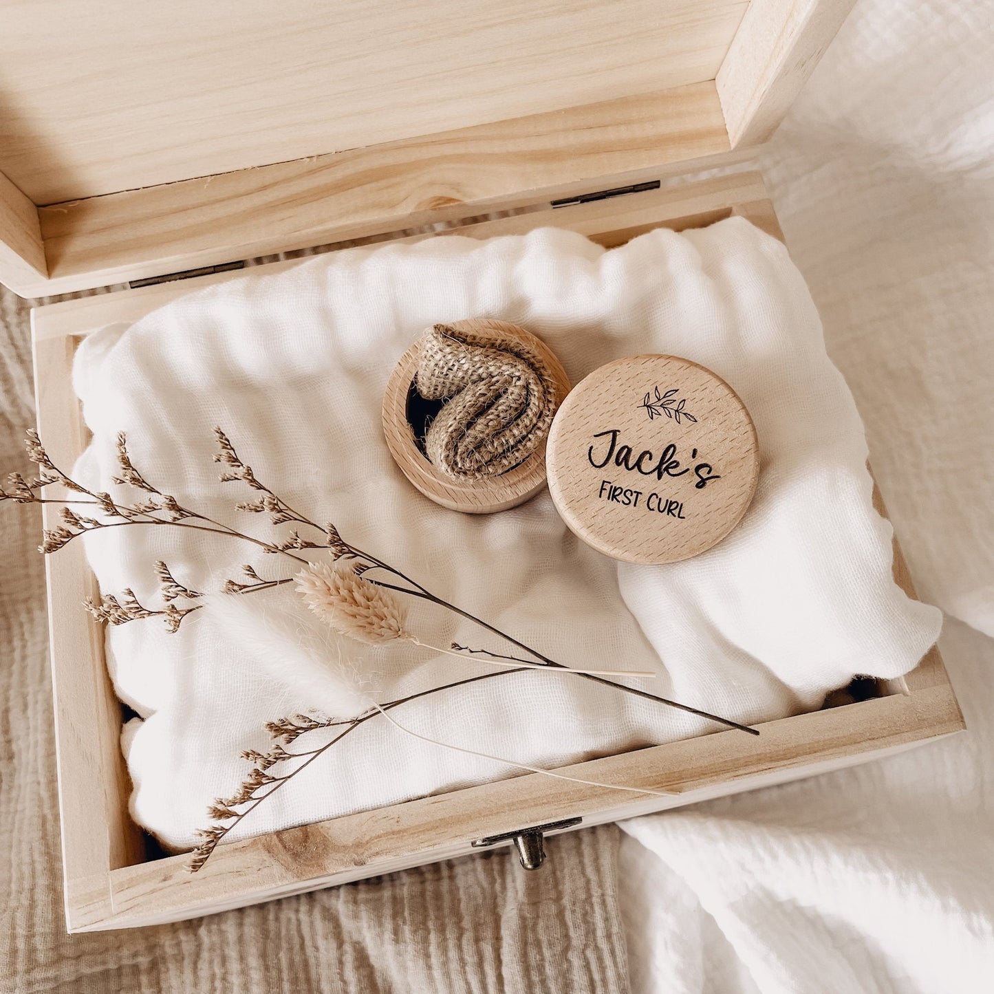 Customize a wooden keepsake for your little one - perfect for capturing their hair and footprints in their first photos.