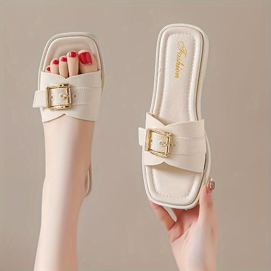 Women's slide sandals with buckle strap design, square open toe, and lightweight construction.