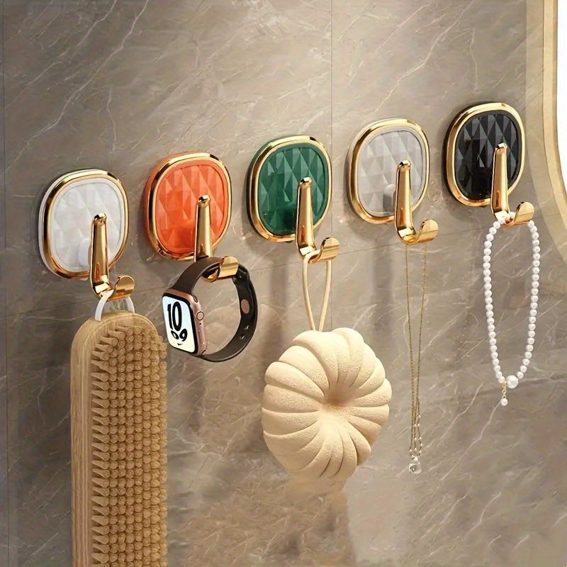 Stylish wall hook for clothes, towels, and robes - easy to install and versatile.