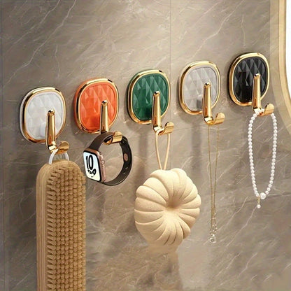 Stylish wall hook for clothes, towels, and robes - easy to install and versatile.