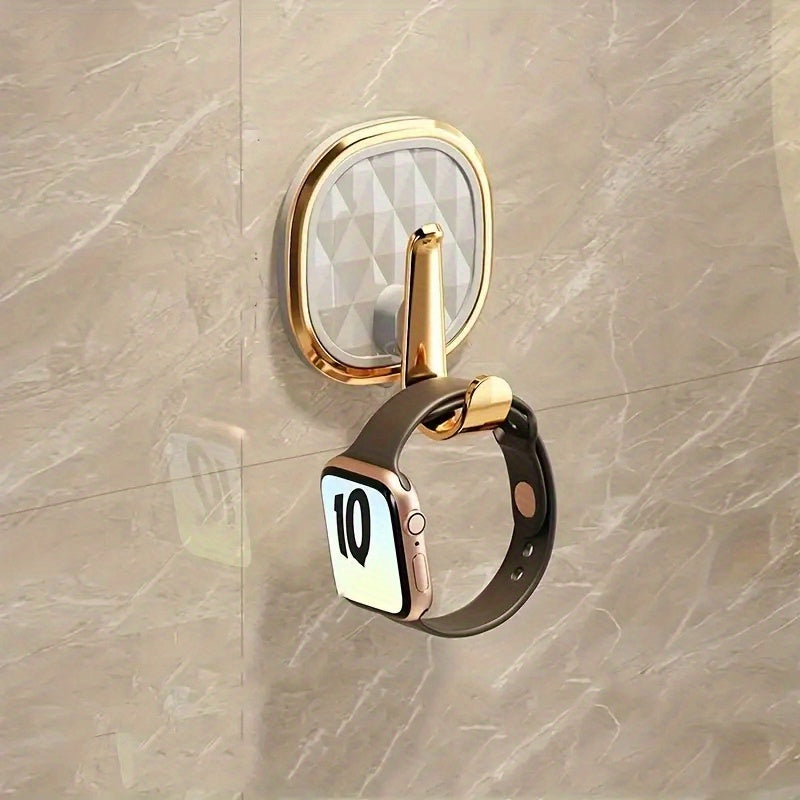 Stylish wall hook for clothes, towels, and robes - easy to install and versatile.