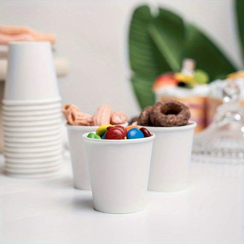 Disposable Small Paper Cups perfect for Supermarket tastings, parties, snacks, office coffee, beverages, candy, hotels, and mini mouthwash. Available in packs of 50 or 100 pieces.