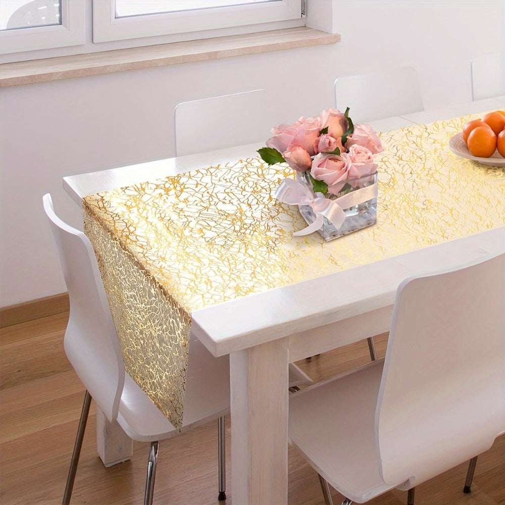 Golden polyester organza table runner with glitter accents, ideal for weddings, showers, and parties.